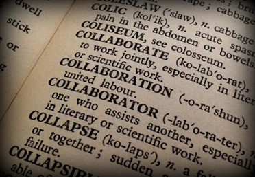 Image of a dictionary defining words close to collaboration